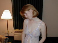 Redhead wife shows her body