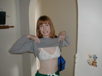 Redhead wife shows her body