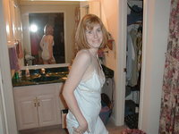 Redhead wife shows her body