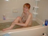 Redhead wife shows her body