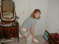 Redhead wife shows her body