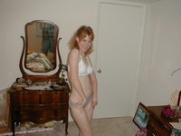 Redhead wife shows her body