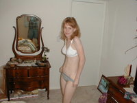 Redhead wife shows her body