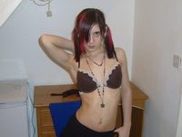 Teenage amateur girl posing at home