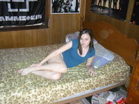 Teenage amateur girl posing on bed