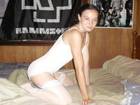 Teenage amateur girl posing on bed