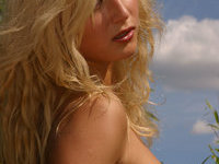 So sweet blond babe sunbathing nude