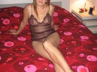 Brunette amateur wife posing on bed