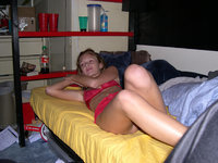 Curly amateur coed in her room