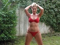 Big tits blonde posing in the garden