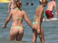 Topless girls at beach