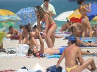 Topless girls at beach