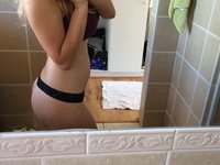 Blonde takes nude selfies