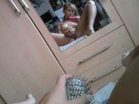 Sexy blonde takes nude selfies