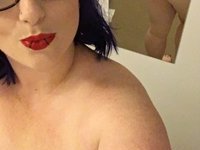 Chubby girl shows her big tits