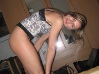 Young amateur wife posing nude at home