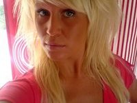 Tanned german blonde with piercied nipples