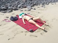 French wife sunbathing topless