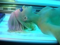 Beautiful amateur blonde girl naked at solarium