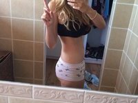 Teenage amateur blonde GF flashing her big tits