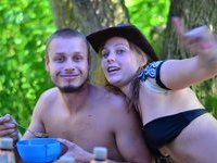 Nudists couples at lake