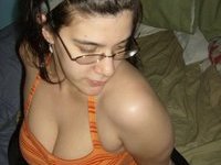 nerdy amateur girl posing and sucking