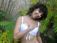 Brunette amateur wife posing naked outdoors