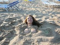 Young amateur GF topless at beach