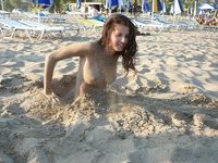 Young amateur GF topless at beach
