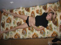 Blond amateur wife posing on bed