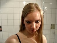 Amateur wife posing at bathroom