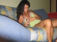 Amateur brunette toying her pussy