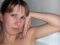Young amateur wife posing at home