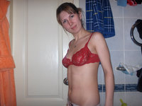 Young amateur wife posing at home