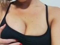 Amateur MILF showing her big tits