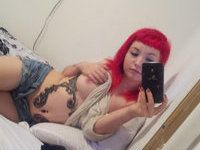 Tattoed redhead girl selfie