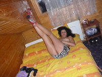 Nice girl in stockings at hotel room