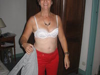 Mature wife undressing