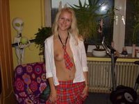 Blonde german girl sexy posing at home