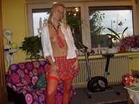 Blonde german girl sexy posing at home