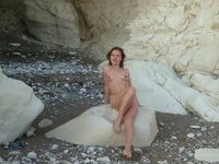 Beautiful young girls naked posing on beach