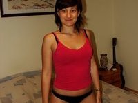 Nice wife posing in sexy clothing and naked