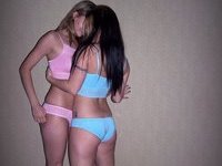 Two girls licking and kissing