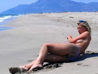 Blond wife sunbathing naked