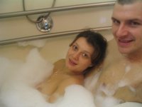 Amateur couple taking bath and fucking