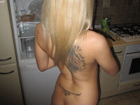 Amateur blonde girl nude cooking