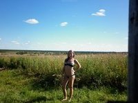 Nice young girl naked posing outdoors