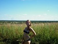 Nice young girl naked posing outdoors