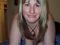 Amateur MILF with big boobs posing and sucking