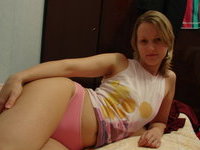 Amateur wife posing on bed